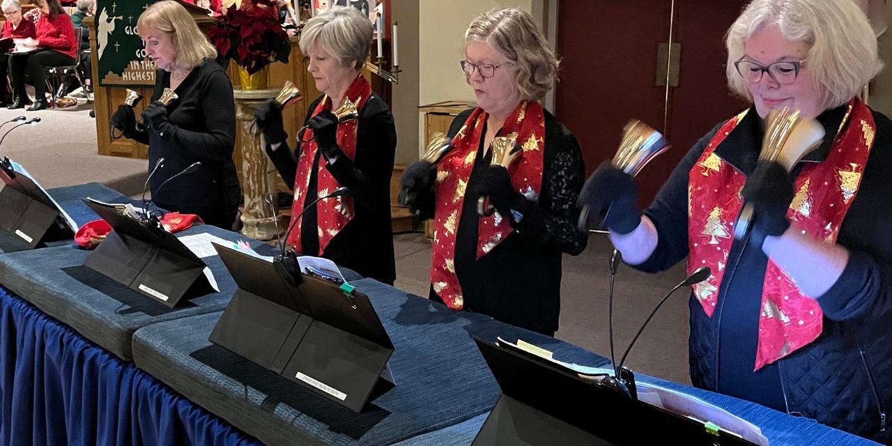 The Christ First bell choir at the Candlelight service